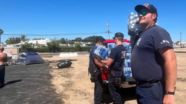 Firefighters in Los Banos provide water donations to the homeless community